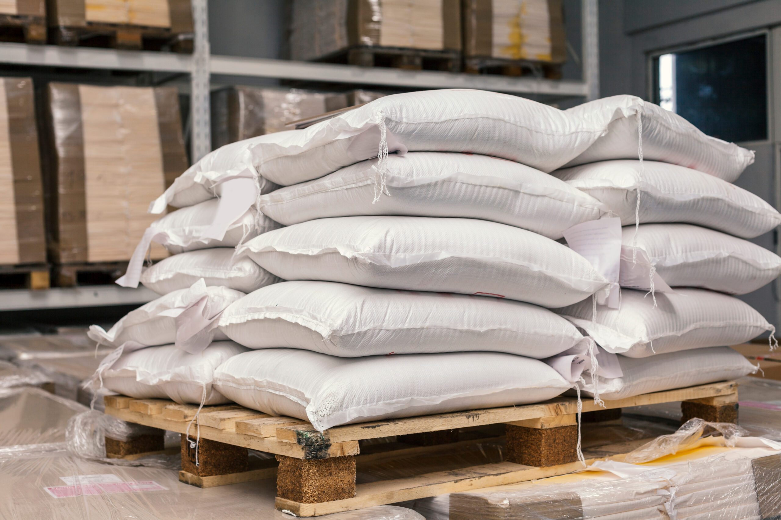 Large sacks on pallets in warehouse