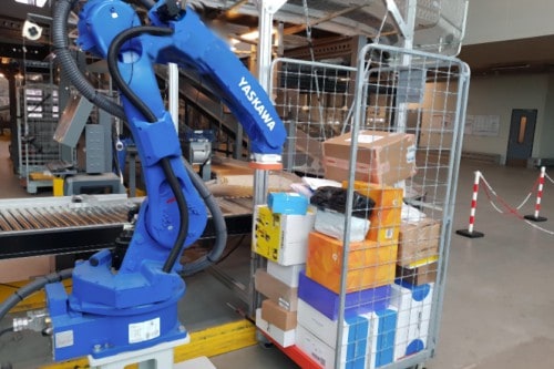 Automated picking of parcels from roll cage